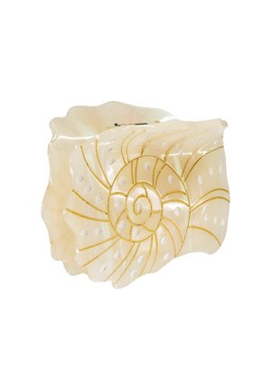 Seashell-shaped clutch in pearlescent white with gold accents and polka dot pattern. Smooth surface with a curved, layered design.