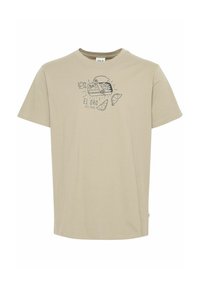 Beige cotton T-shirt featuring a printed graphic design with the text "EL ORO DEL MAR" and illustrations of waves and seafood. Short sleeves.