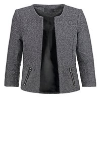 Šedý tvídový sako s kulatým výstřihem, rukávy tří čtvrtinové délky a dvěma předními kapsami na zip; uvnitř hladká černá podšívka.