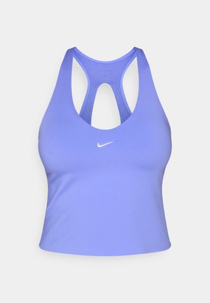 Purppuranvärinen urheiluliivit, joissa on racerback-malli ja sileä kangas. Edessä on pieni valkoinen Nike-logo.