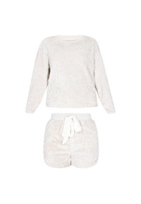 Kerman loungewear-aset, joka on valmistettu kermaisesta fleece-materiaalista. Settiin kuuluu pitkähihainen paita, jossa on teksturoitu kuvio, sekä sopivat shortsit, joissa on joustava vyötärönauha ja solmu.