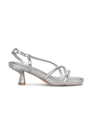 Silver metallic strappy sandal with a square toe, low flared heel, and adjustable ankle buckle strap.