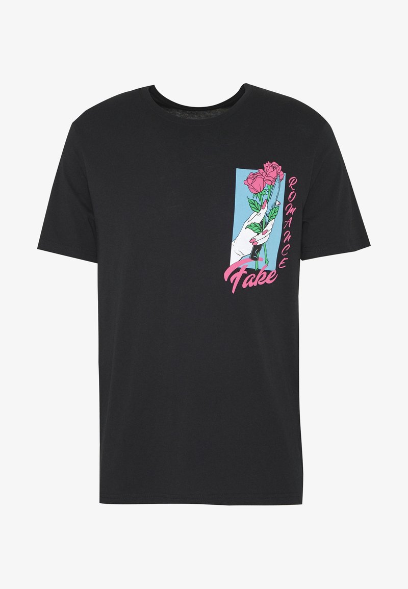 Black cotton t-shirt featuring a graphic design of a hand holding pink roses, with the word "Romance" and "Fake" in pink text.