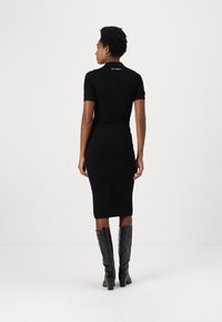 pure cashmere STRAIGHT MIDI SKIRT - Pouzdrová sukně - black