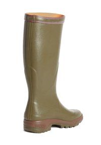 Green rubber knee-high boot with a smooth texture, brown outsole, and a contrasting light brown interior. Features a seam design and patterned sole.