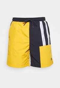 Shorts con un design a blocchi di colore, con sezioni gialle e blu navy. Realizzati in tessuto leggero con vita regolabile e tasca laterale.