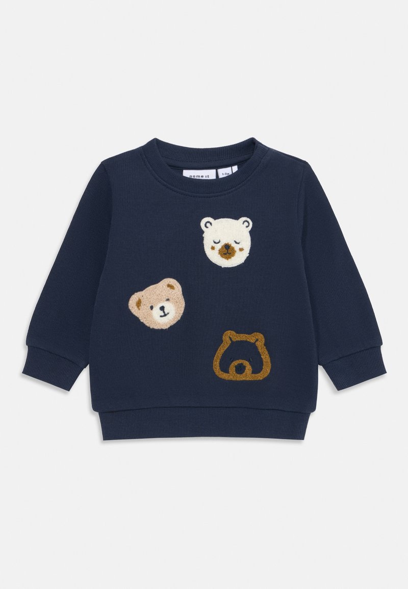 Marinblå bomulls sweatshirt med tre applikationsbear-ansikten i beige, vitt och brunt. Ribbad mudd och nederkant. Klassisk rund halsringning.