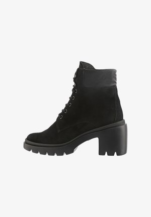 Black suede ankle boot with lace-up front, padded collar, lug sole, and chunky block heel, shown from the outer side.