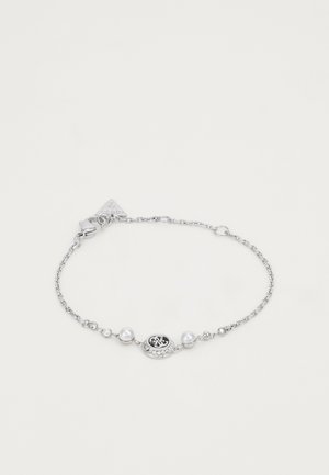 Silver chain bracelet featuring round white pearls, an oval charm with intricate design, and a secure clasp.