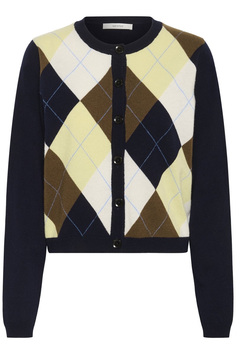 Cardigan en maille avec une base bleu marine et un motif losanges en crème, jaune, marron et bleu clair. Boutons noirs et poignets côtelés.