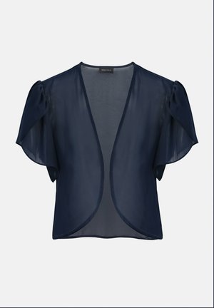 Ανοιχτό μπλε μπλούζα ναυτικού στυλ με κοντά φουσκωτά μανίκια και στρογγυλεμένο τελείωμα, κατασκευασμένη από ελαφρύ ύφασμα, με ετικέτα μάρκας στο εσωτερικό του λαιμού.