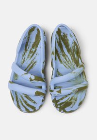 Blue rubber sandals with camouflage green streaks, featuring two wide straps across the top and a textured footbed for grip.