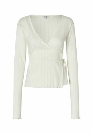 Top lungo a maniche lunghe bianco a costine con scollatura a V profonda, vita con cintura e orlo arricciato. Il tessuto presenta strisce verticali per dare texture.