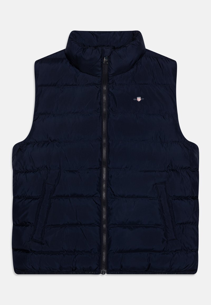 Marineblaues Puffer-Westen mit hohem Kragen, Frontreißverschluss und Seitentaschen. Ausgestattet mit einem gesteppten Muster und kleinem Emblem auf der Brust.