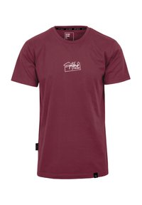 Bordeauxfarbener Baumwoll-T-Shirt mit kurzen Ärmeln, ausgestattet mit einem weißen "Spitdub EST 2017" Logo auf der Brust. Einfaches Design, Rundhalsausschnitt, Etikett an der Seite.