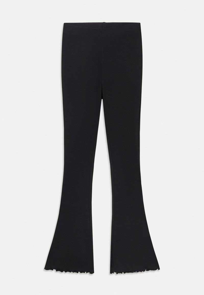 Leggings noires évasées en tissu extensible, avec une taille lisse et un ourlet à franges en bas.