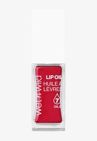 Huile à lèvres rouge dans un flacon rectangulaire transparent avec un bouchon rectangulaire blanc. Présente "huile à lèvres", "7 huiles" et "Wet n Wild" en texte blanc.
