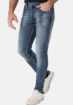 ZERRISSENE SUPER SKINNY MITTLERE AUFNAHME GRÖSSE IN ZOLL - Jeans Skinny Fit - blau