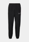 NIKE ACADEMY23 TRACK PANTS - Tracksuit bottoms - black/white