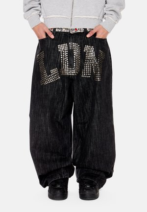 COLOSSUS UNISEX - Túlméretezett farmernadrág - black