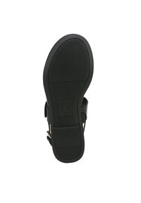 Semelle de sandale noire en caoutchouc texturé, design plat et semelle intérieure moulée. Caractéristiques d'une sangle réglable et d'un logo de marque en relief.