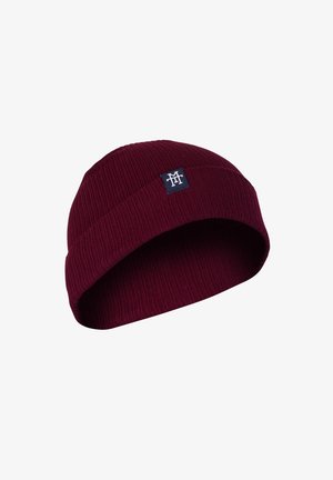 Burgundy knit beanie with ribbed texture, folded brim, and a small square logo patch in dark blue on the front.