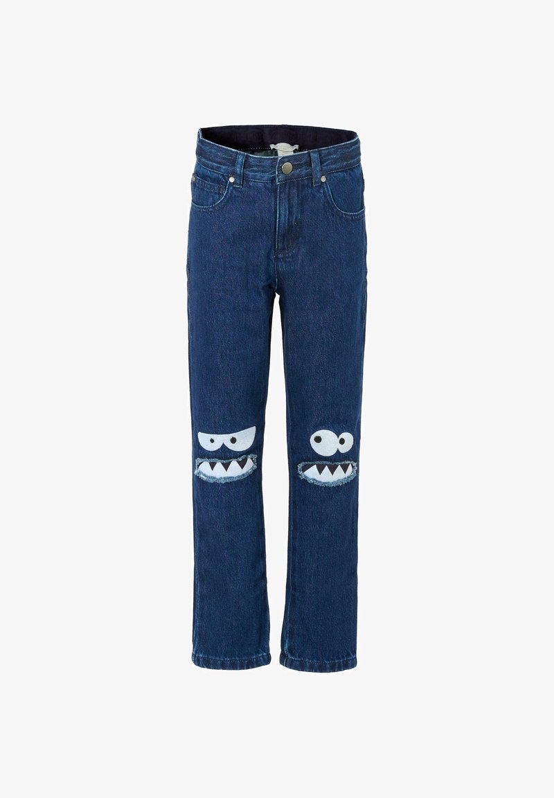 Jean pour enfants en denim bleu marine avec deux détails de genoux en patch, représentant des visages de monstres de dessin animé, incluant des yeux et des dents pointues.