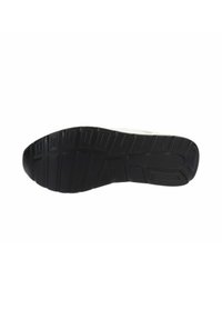 Sole di sneaker in gomma nera con un pattern testurizzato per la presa. Presenta una superficie uniforme e liscia e un design della punta arrotondata.