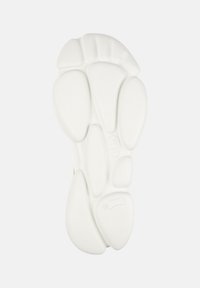 White rubber shoe sole with a textured, contoured design featuring rounded patterns and a small logo, indicating size 36.