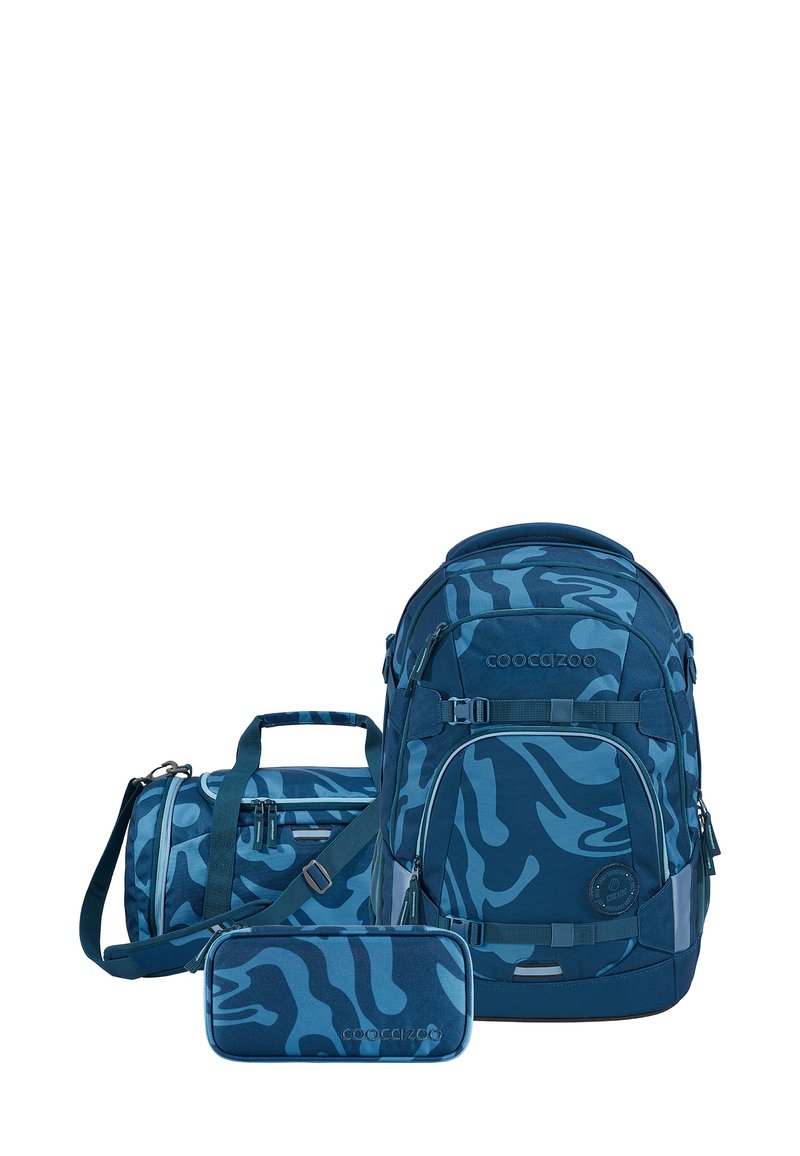 Blue camouflage backpack, matching cylindrical bag and pencil case; durable fabric, smooth texture, adjustable straps, and zipper closures.