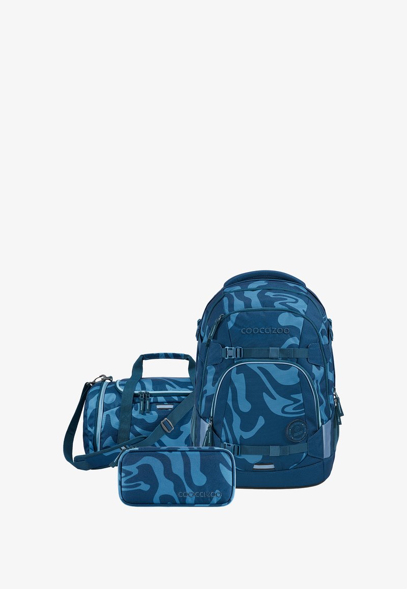 Blue camouflage backpack, matching cylindrical bag and pencil case; durable fabric, smooth texture, adjustable straps, and zipper closures.