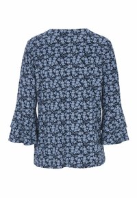 Tummansininen pusero, jossa on vaaleansinisiä kukkakuoseja, kellotuvat hihat ja pyöreä kaula-aukko, näkyy takaa.