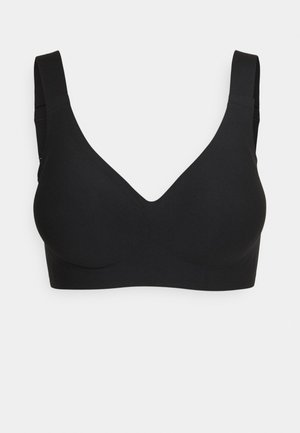 Crni grudnjak s V-izrezom, napravljen od glatkog materijala. Ima široke naramenice i bešavni finiš za udobnost.