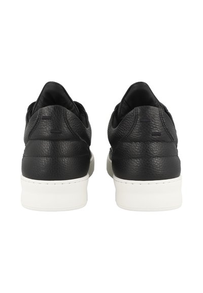 Black leather sneakers with textured finish, white rubber sole, and padded ankle support. Simple design with tonal stitching details.