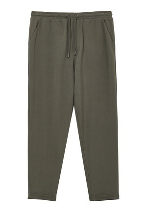 Pantalons de survêtement vert foncé en tissu doux, avec une taille élastique et un cordon de serrage, des poches latérales et des ourlets à la cheville.