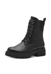 Stivale alla caviglia in pelle nera con lacci frontali, pannelli elastici laterali e suola in gomma spessa. Presenta una texture liscia e una punta rotonda.