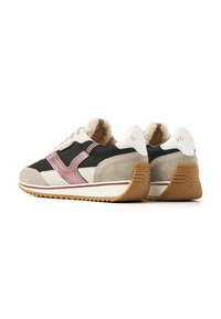 Sporty sneakers featuring a mix of black mesh, beige suede, and metallic pink accents. Soft lining and textured rubber sole.