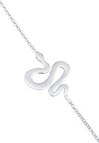 Silverfärgad ormformad armband med en slät, polerad yta och en smal kedja, prydd med en spiralformad design och en avsmalnande svansände.