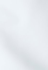 White fabric with a smooth texture, slightly reflective surface, displaying subtle shades and soft folds.