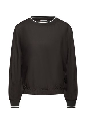 Schwarzes Langarmoberteil aus glattem Stoff, mit rundem Halsausschnitt und weißer Paspel, sowie elastischen Bündchen mit gestreiftem Detail an den Handgelenken.