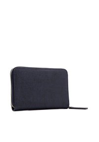 Portafoglio in pelle blu navy con finitura texturizzata e cerniera dorata. Design sottile con linguetta per una facile maneggevolezza. Ideale per carte e contante.