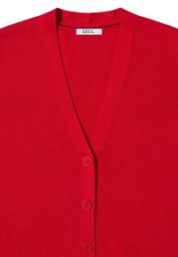 Maglione rosso con scollatura a V, realizzato in morbido tessuto a maglia. Presenta cinque bottoni abbinati lungo la parte anteriore. Etichetta del marchio: CECIL.