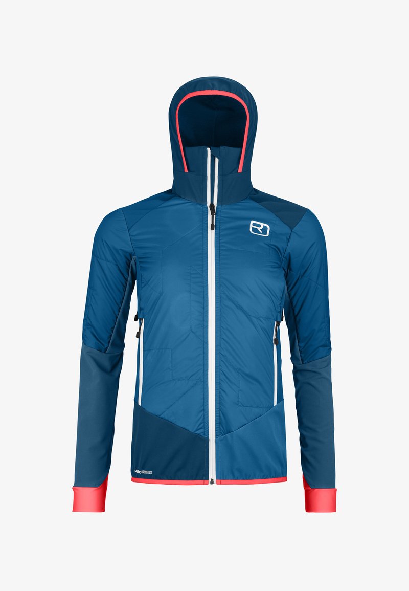 Blue insulated jacket with a hood, contrasting coral trim, zippered front, and side pockets. Features geometric stitching and soft cuffs.
