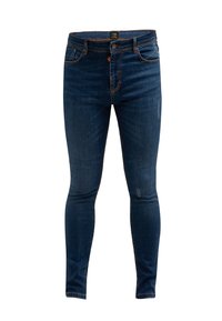 Vaqueros ajustados de color azul oscuro, fabricados en denim. Las características incluyen cinco bolsillos, costuras naranjas y una etiqueta de marca en la cinturilla.