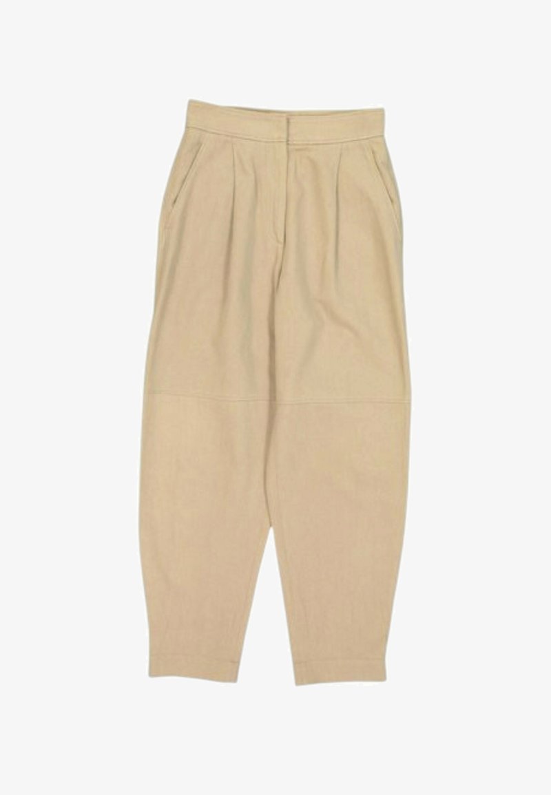 Pantalon beige taille haute fuselé avec plis et poches latérales, avec une coupe décontractée se resserrant vers les chevilles.