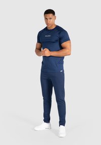 Smilodox MAISON - Verryttelyhousut - dunkelblau