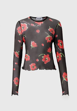 Črn prosojen dolg rokav vrh s rdečimi cvetličnimi vzorci, valovitim robom in natisnjenim besedilom. Narejen iz lahkega, prosojnega materiala.