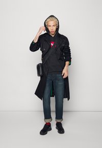 Levi's® 527™ SLIM BOOTCUT - Calças de ganga justas - overhaul