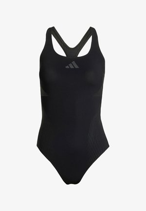 Bañador de una pieza negro con un diseño elegante, que presenta un tirante cruzado en la espalda, detalles texturizados y un logo sutil en el pecho.