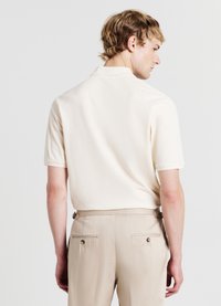 Calliope Polo - sabbia